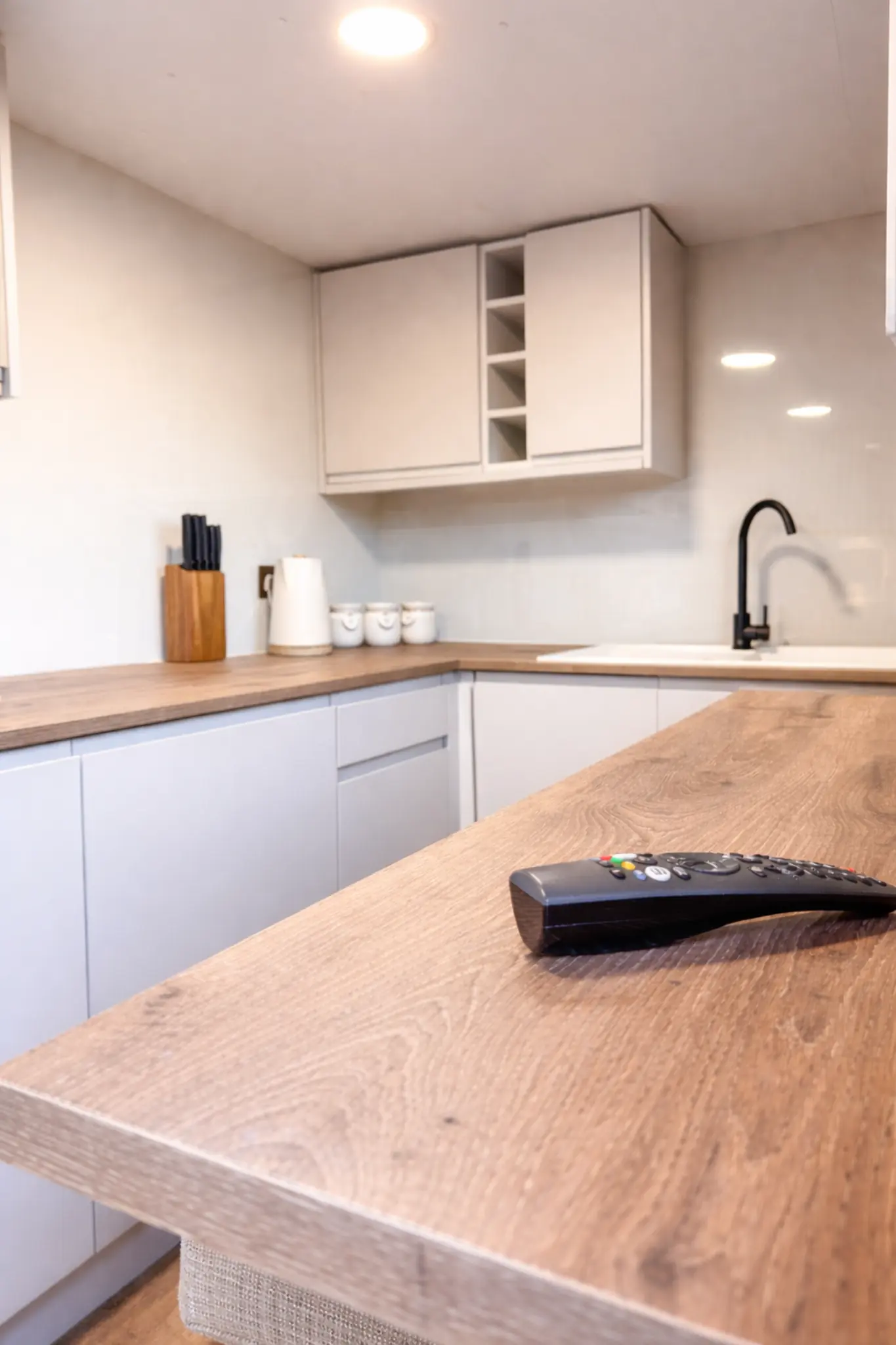 Kitchen pod interior — sink and cabinetry